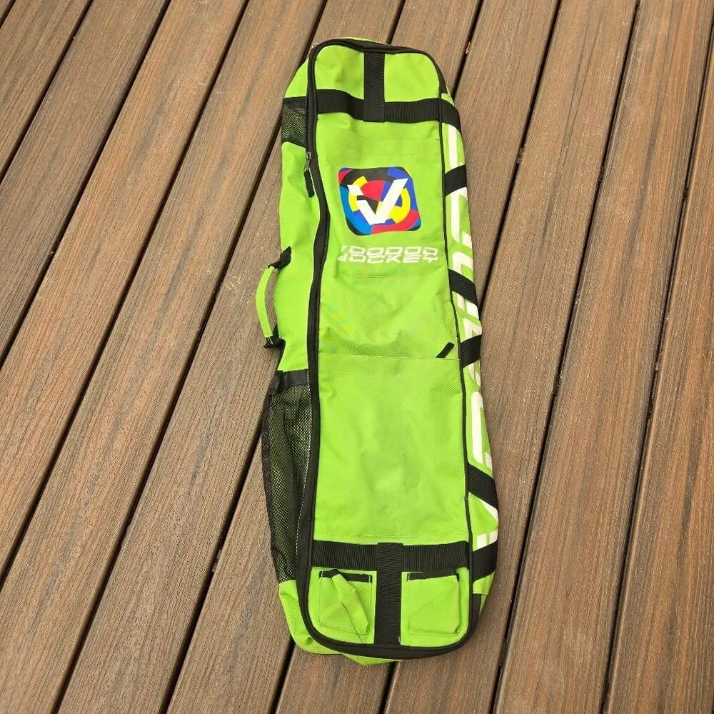 Voodoo Hockey Bag green and black back pack straps easy carry, pockets